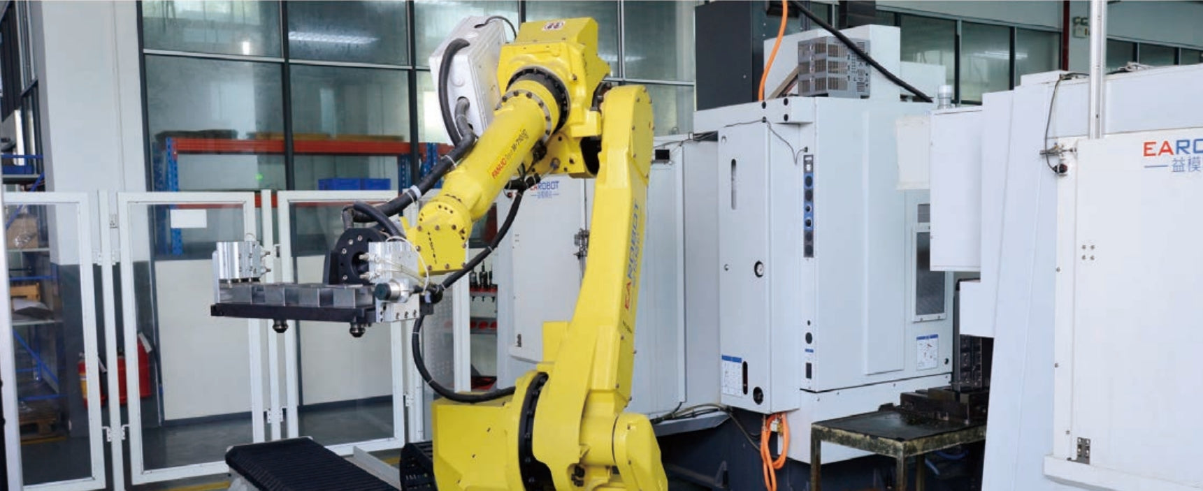 Automated Flexible Manufacturing System for Scalable CNC Production Lines